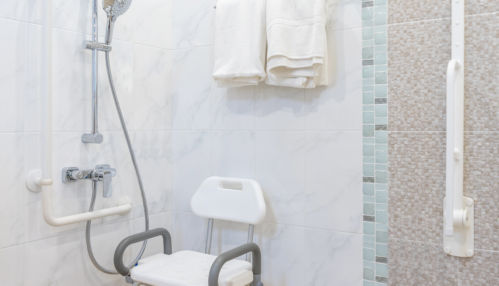 Interior of bathroom for the disabled or elderly people. Handrail for disabled and elderly people in the bathroom